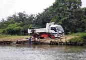 Sand mining on the Maha Oya River